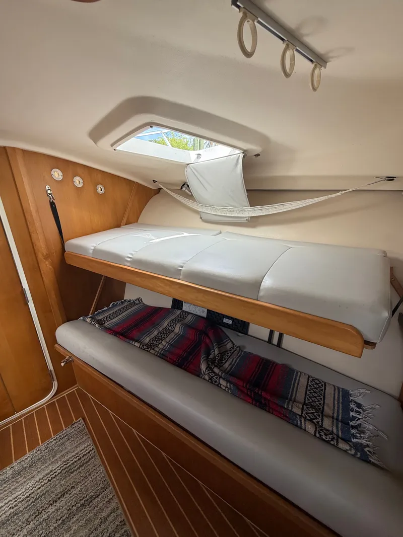 Slide: The Image of Interior of 2000 Luhrs Tournament 290 Open with sleeping area. - 9