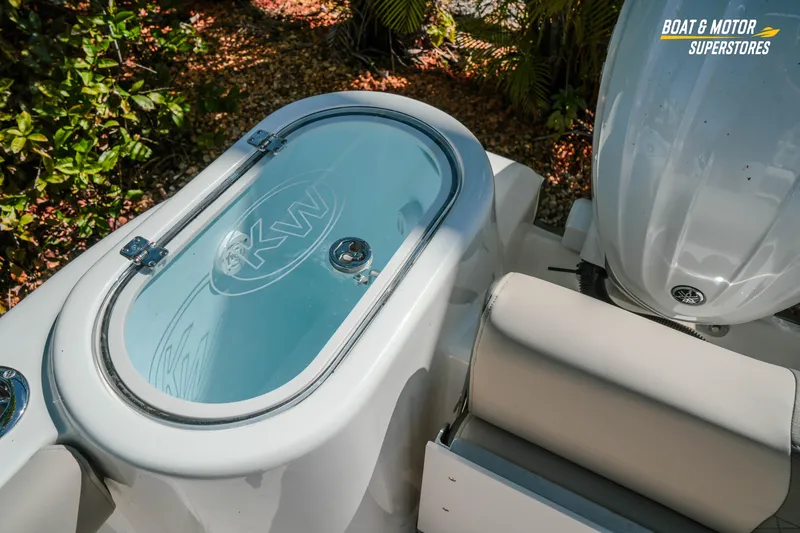 Slide: The Image of 2026 Key West 260 Center Console boat with livewell and engine detail. - 11