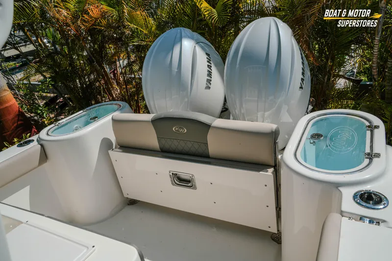 Slide: The Image of 2026 Key West 260 Center Console boat with Yamaha engines and seating area. - 32