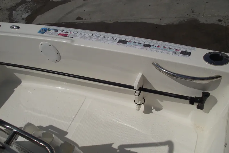 Slide: The Image of 2017 Key West 1520 Center Console interior with rod holder and measurement guide. - 13