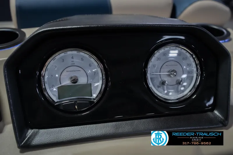 Slide: The Image of Dashboard of 2026 Bennington 21 SLJ boat with dual gauges and branding. - 32