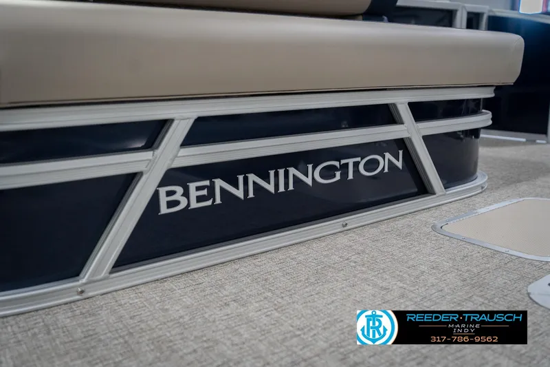 Slide: The Image of 2026 Bennington 21 SLJ pontoon boat, beige seating, Reeder-Trausch Marine logo. - 47