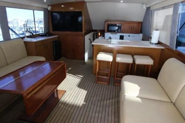 Slide: The Image of Luxurious interior of a 2000 Ocean Yacht 48 Super Sport with modern amenities. - 24