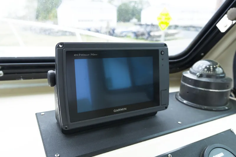 Slide: The Image of Garmin echoMAP 70dv on May-Craft 2550 Cabin boat dashboard, year 2000 model. - 12