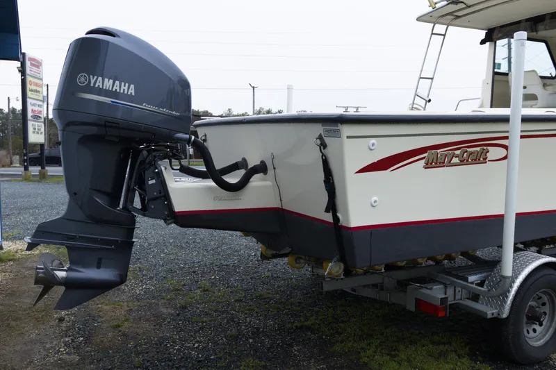 Slide: The Image of 2000 May-Craft 2550 Cabin boat with Yamaha outboard motor on trailer. - 5