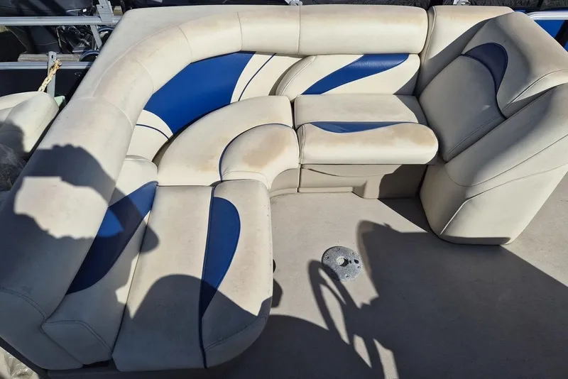 Slide: The Image of 2014 SunChaser 8522 C-N-F boat seating with blue and beige upholstery. - 7