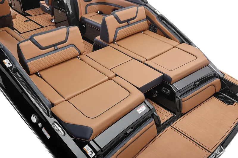 Slide: The Image of Manufacturer Provided Image: 2026 Yamaha Boats 275SD interior with luxurious tan and black seating. - 10