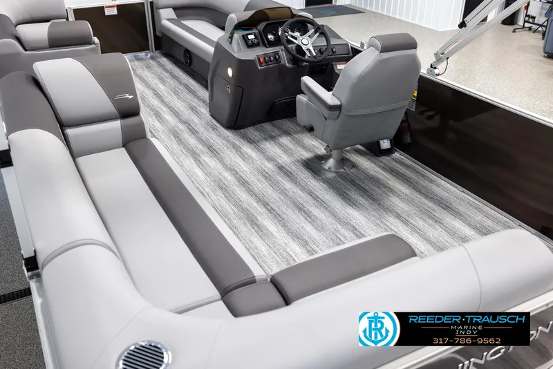 Slide: The Image of Interior of 2025 Bennington 21 SL pontoon boat with gray seating. - 11