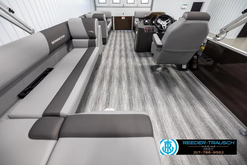 Slide: The Image of 2025 Bennington 21 SL boat interior with gray seating. - 16