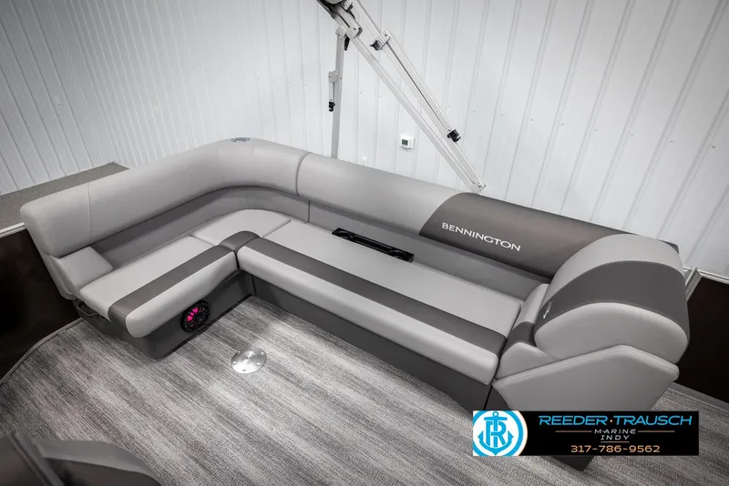 Slide: The Image of Interior of 2025 Bennington 21 SL with gray upholstery. - 22
