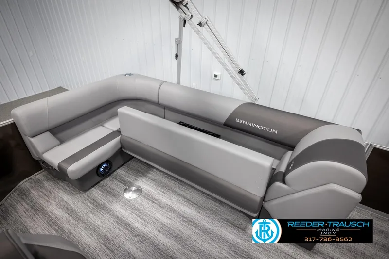 Slide: The Image of Interior of 2025 Bennington 21 SL with gray upholstery. - 24