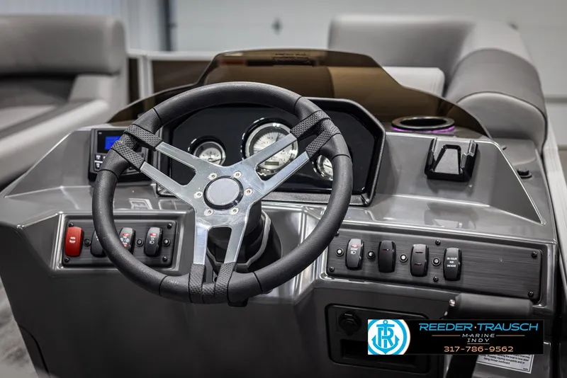 Slide: The Image of Steering wheel and dashboard of the 2025 Bennington 21 SL. - 26