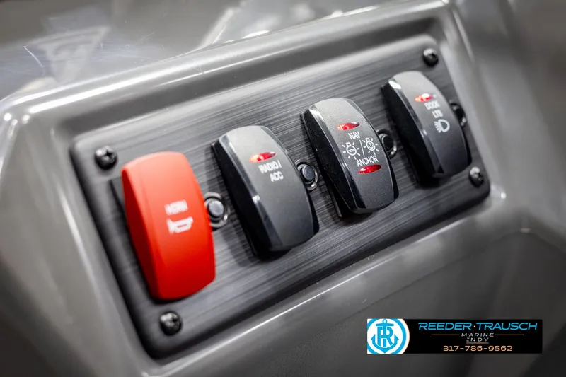 Slide: The Image of Control panel of 2025 Bennington 21 SL with various switches. - 29