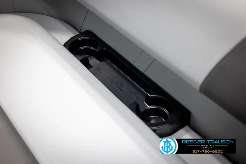 Slide: The Image of 2025 Bennington 21 SL boat interior with cup holders. - 40