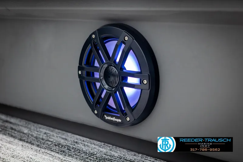 Slide: The Image of Rockford Fosgate speaker with blue lighting on Bennington 21 SL 2025. - 41