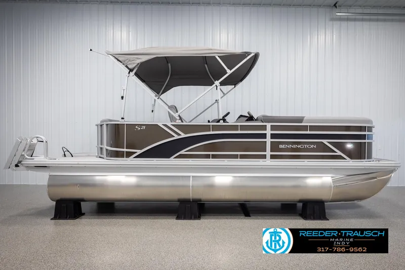 Slide: The Image of 2025 Bennington 21 SL pontoon boat in showroom. - 5