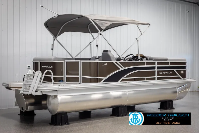 Slide: The Image of 2025 Bennington 21 SL pontoon boat in showroom. - 6