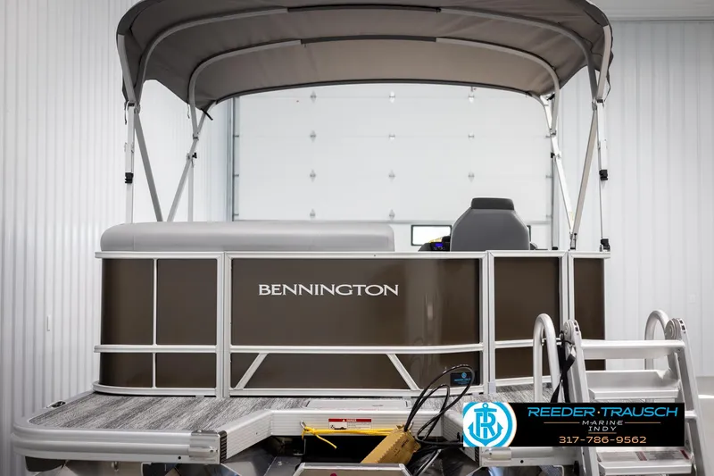 Slide: The Image of Bennington 21 SL pontoon boat 2025 in storage facility. - 7