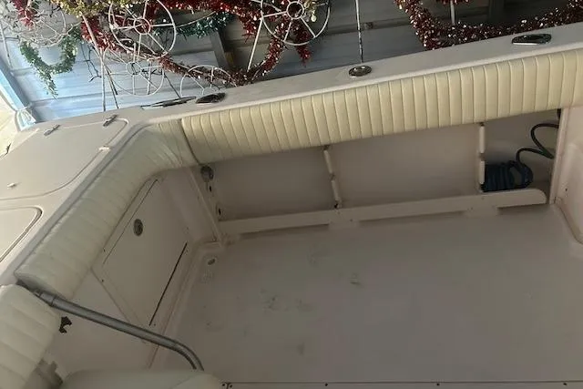 Slide: The Image of 2003 Grady-White Express 330 boat interior with festive decorations. - 18