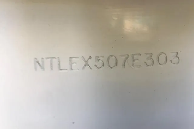 Slide: The Image of Hull identification number on 2003 Grady-White Express 330 boat. - 26