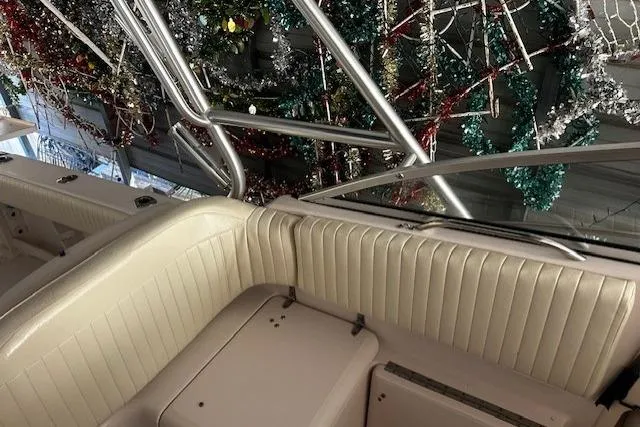 Slide: The Image of 2003 Grady-White Express 330 boat interior with festive decorations in background. - 31