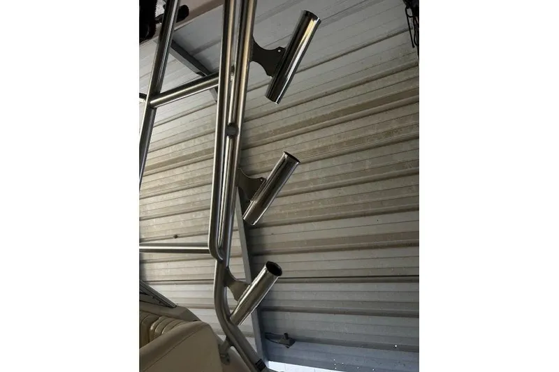 Slide: The Image of Stainless steel rod holders on a 2003 Grady-White Express 330 boat. - 32