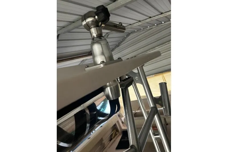 Slide: The Image of Close-up of a 2003 Grady-White Express 330 boat's metal fittings and structure. - 33