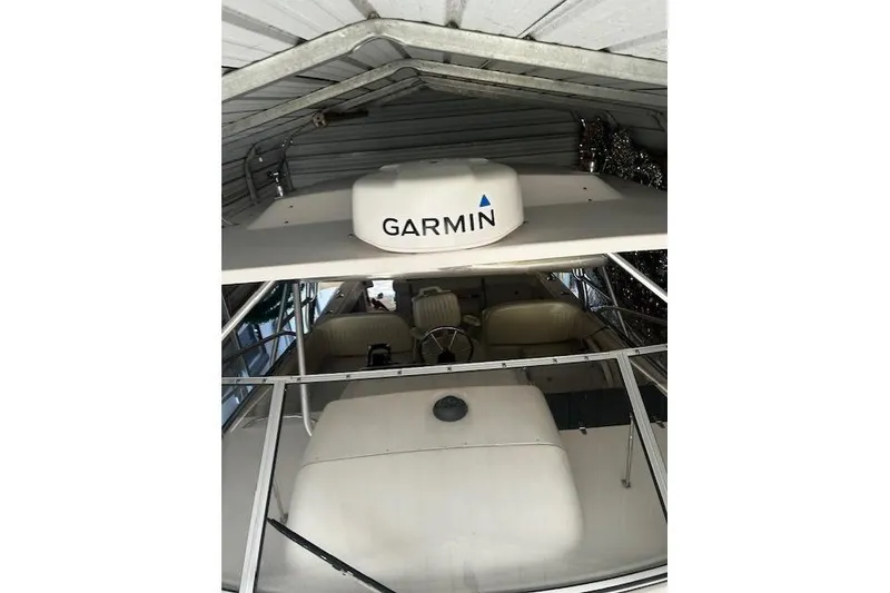 Slide: The Image of 2003 Grady-White Express 330 boat with Garmin equipment in storage. - 36