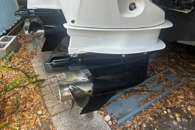 Slide: The Image of Propeller and lower unit of a 2003 Grady-White Express 330 boat on dry land. - 37