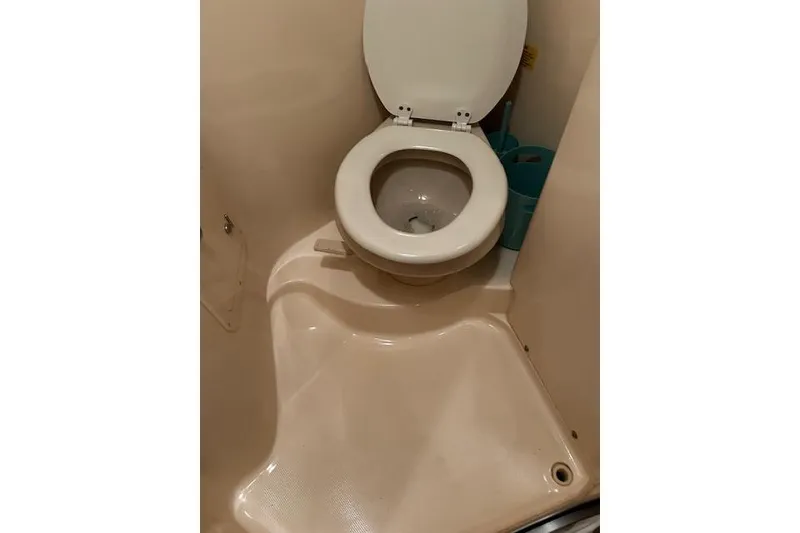 Slide: The Image of Marine toilet in 2003 Grady-White Express 330 boat bathroom. - 51