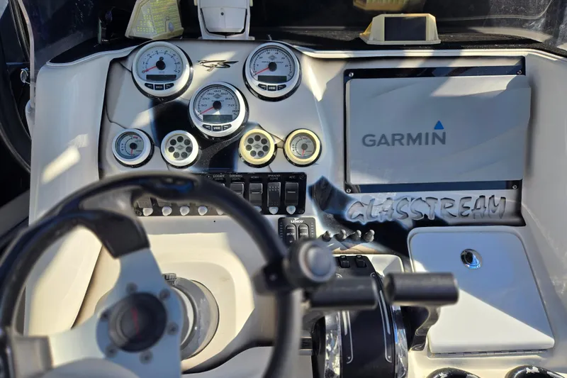 Slide: The Image of Dashboard of a 2011 Glasstream 280 SCX boat with Garmin navigation system. - 10