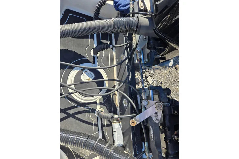 Slide: The Image of Close-up of 2011 Glasstream 280 SCX boat engine components and wiring. - 25