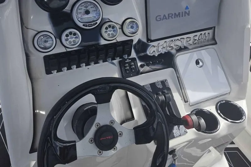 Slide: The Image of Steering console of 2011 Glasstream 280 SCX boat with Garmin navigation system. - 4