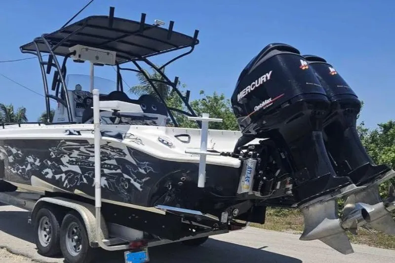 Slide: The Image of 2011 Glasstream 280 SCX boat on trailer with dual Mercury outboard engines. - 9