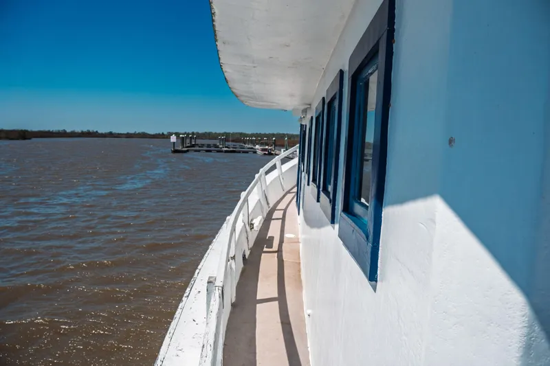 Slide: The Image of Side view of a 1977 Saint Augustine 43 Trawler on a sunny day. - 12