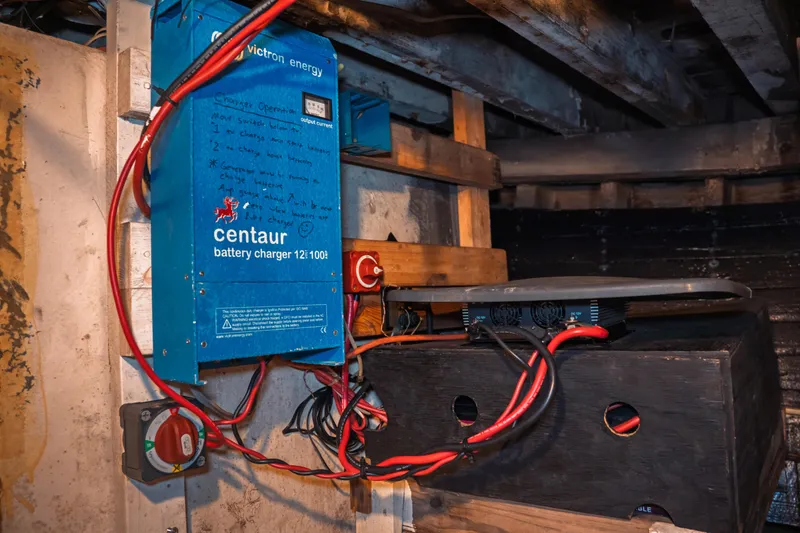 Slide: The Image of Electrical setup with Victron Energy Centaur battery charger on 1977 Saint Augustine Trawler 43. - 66