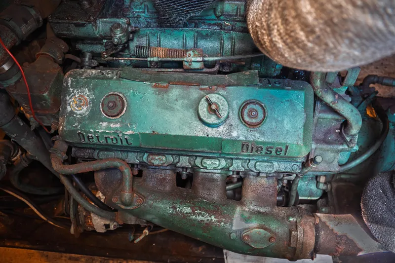 Slide: The Image of Engine of a 1977 Saint Augustine 43 Trawler, featuring a Detroit Diesel motor. - 71