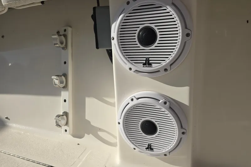Slide: The Image of Speakers on a 2012 Fountain 38 CC Tournament Edition boat interior. - 32