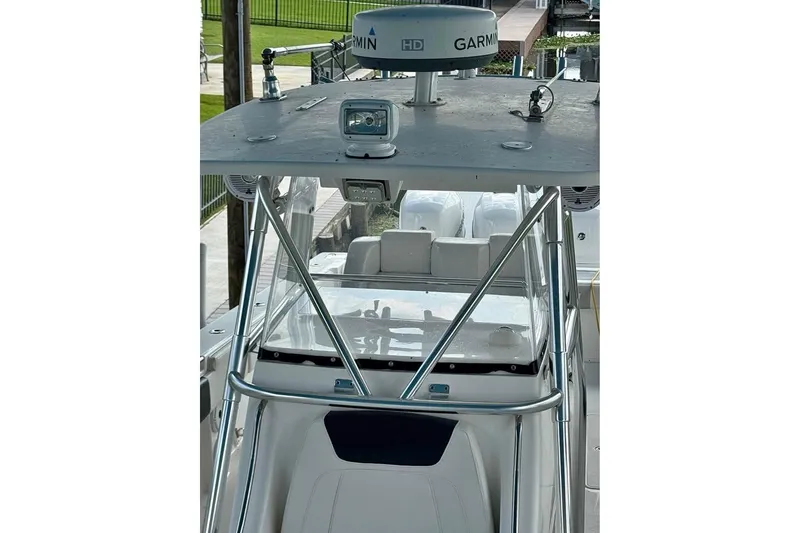 Slide: The Image of 2012 Fountain 38 CC Tournament Edition boat with Garmin radar and sleek design. - 36
