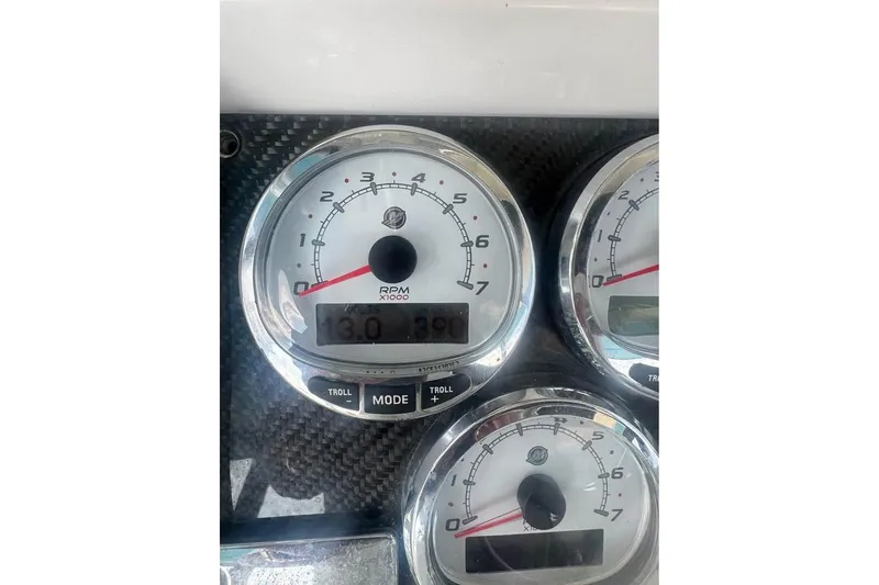 Slide: The Image of Close-up of 2012 Fountain 38 CC Tournament Edition boat gauges displaying RPM and voltage. - 42