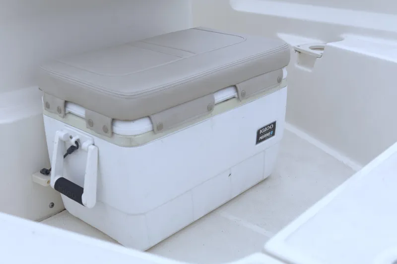 Slide: The Image of Boston Whaler 150 Montauk 2021 boat with Igloo Marine cooler seat. - 6