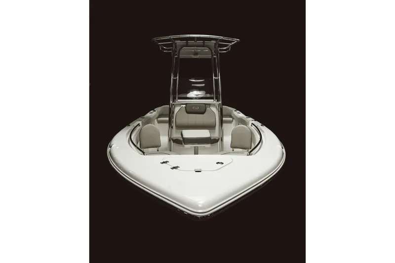 Slide: The Image of 2026 Key West 203 FS boat, front view, sleek design, dark background. - 17