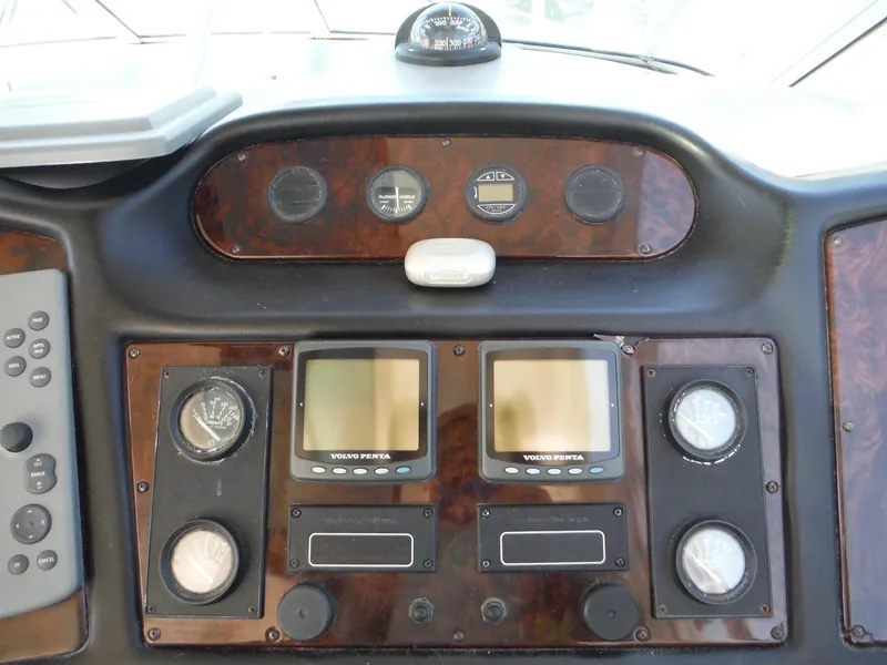 Slide: The Image of Dashboard of a 2005 Cruisers Yachts 455 Express Motoryacht with navigation instruments. - 15