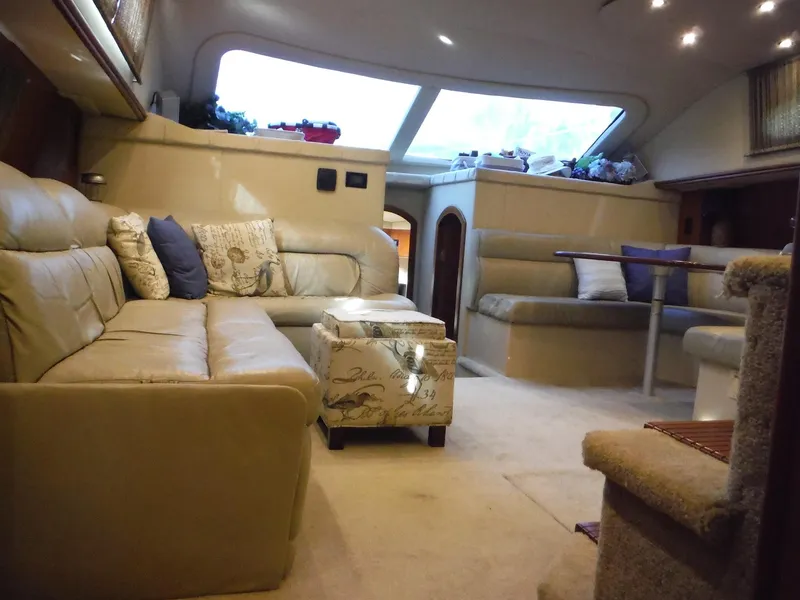 Slide: The Image of Luxurious interior of 2005 Cruisers Yachts 455 Express Motoryacht with leather seating and skylight. - 44