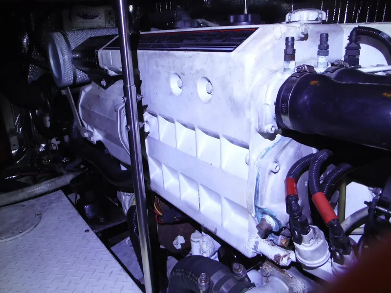 Slide: The Image of Engine compartment of a 2005 Cruisers Yachts 455 Express Motoryacht. - 49