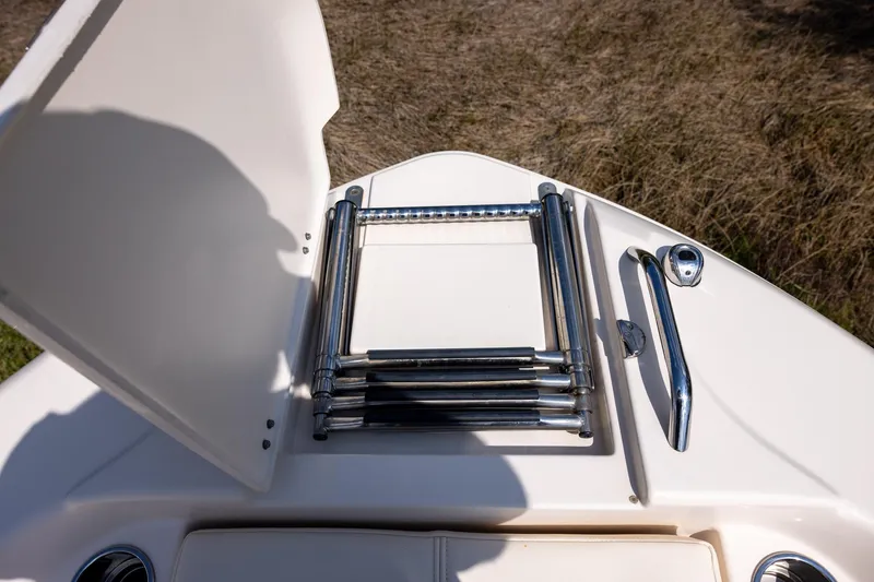 Slide: The Image of 2021 Grady-White 251 Coastal Explorer boat ladder and handle detail. - 13