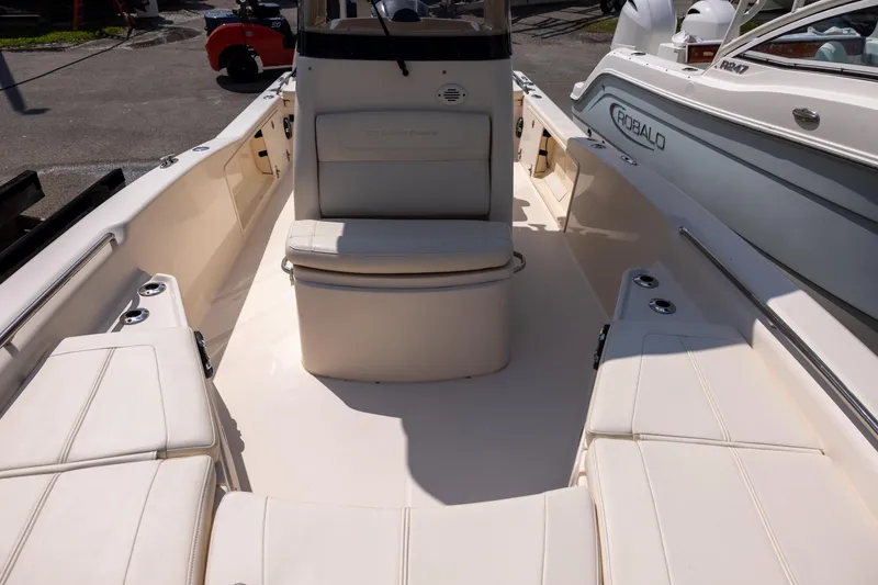 Slide: The Image of 2021 Grady-White 251 Coastal Explorer boat interior with seating and storage. - 14