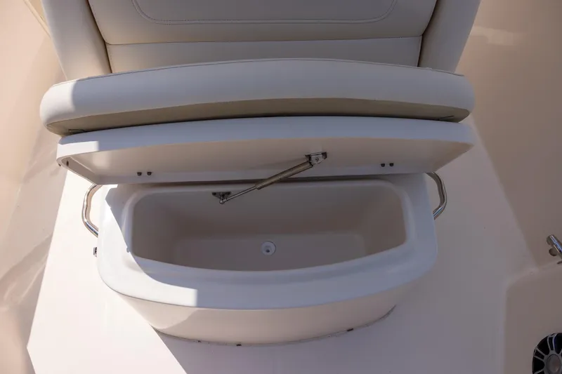 Slide: The Image of Open storage compartment on 2021 Grady-White 251 Coastal Explorer boat. - 15