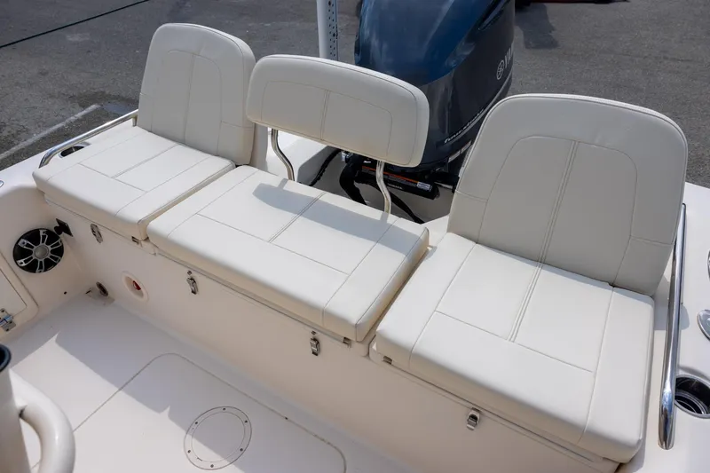 Slide: The Image of 2021 Grady-White 251 Coastal Explorer boat seating with Yamaha engine in background. - 5