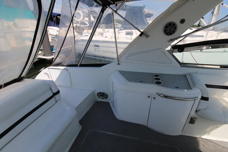 Slide: The Image of 2005 Formula 330 Sun Sport boat interior with seating and storage compartments. - 18